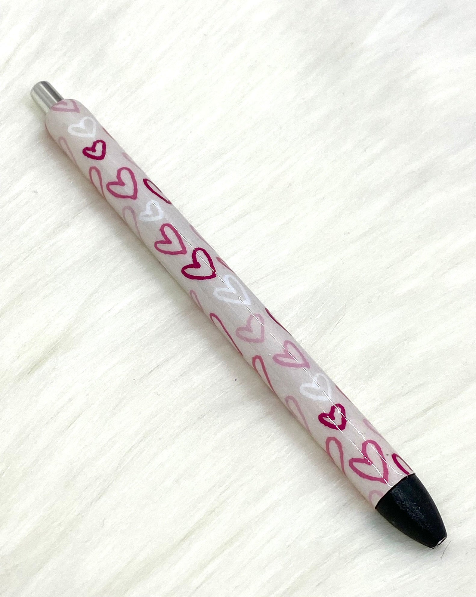 Light gray with hearts pen