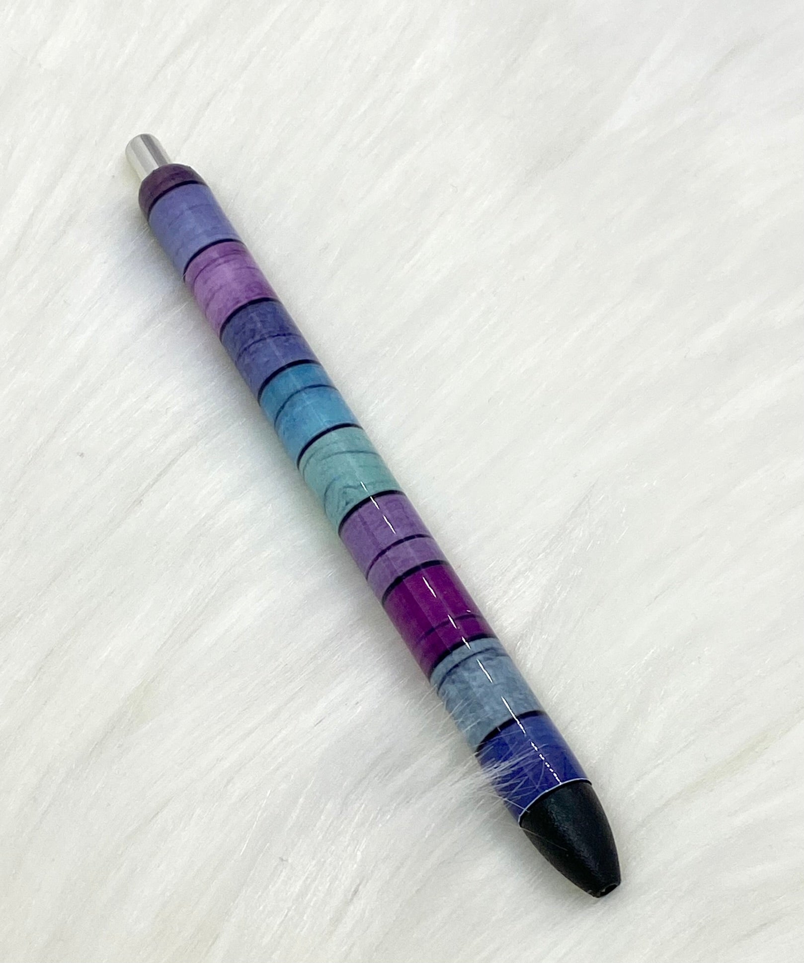 Colored wood plank pen